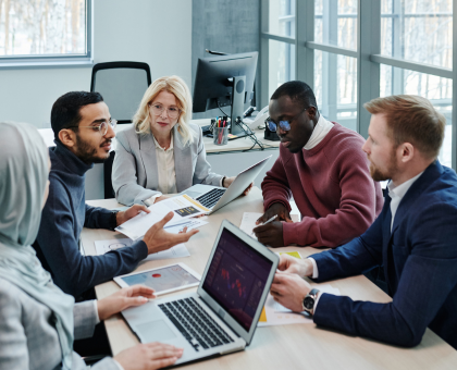 Picture of employs discussing what documents to shred as part of their spring clean